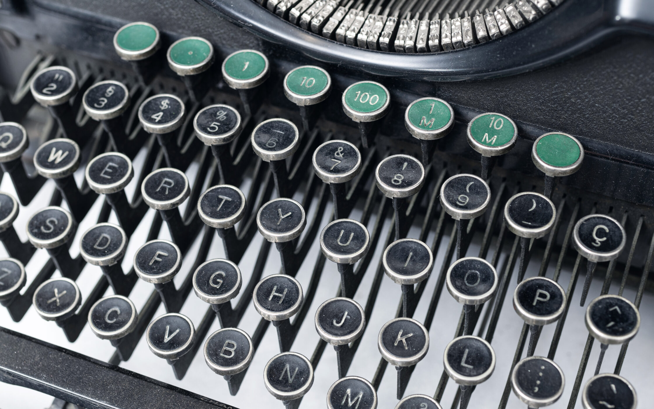 Typewriter close-up emphasizing the craft of writing website copy
