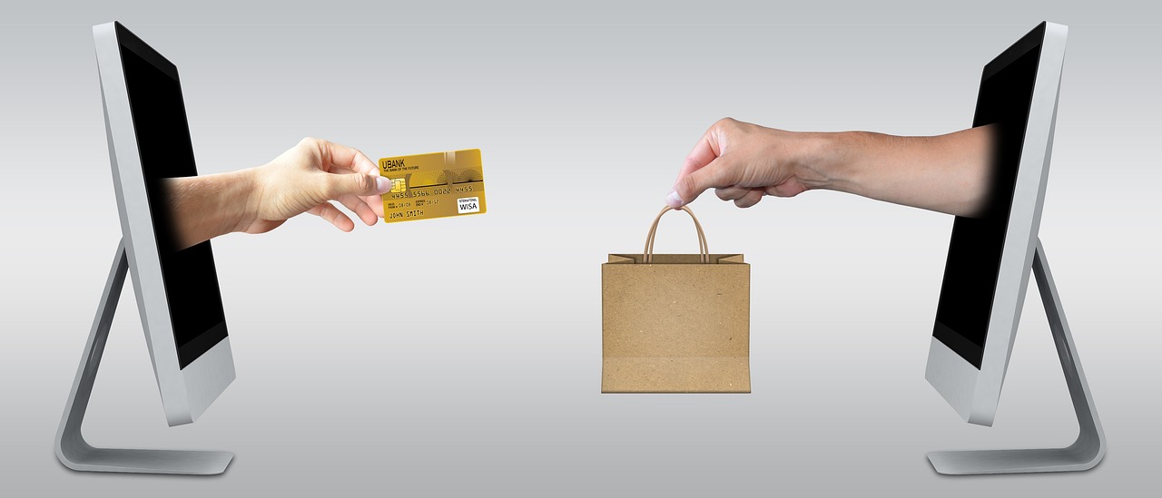Picture showing a transaction on a webshop between a customer and a business owner during the checkout process depicting one website purpose. 